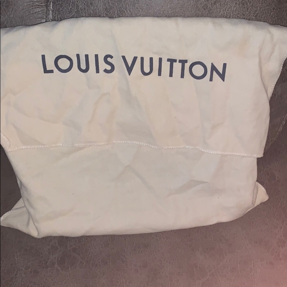 Louis Vuitton pouch, movado watch and mk watch